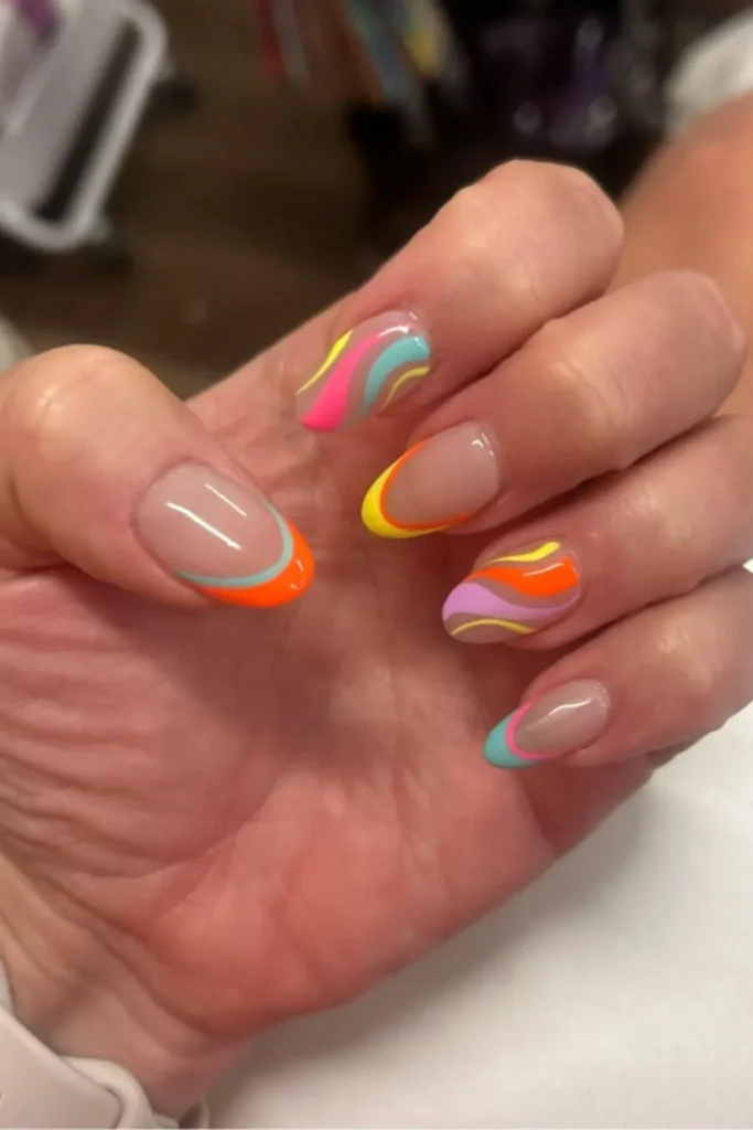 Colorful neon swirls and vibrant double French tips on nude almond nails for vacation nails ideas