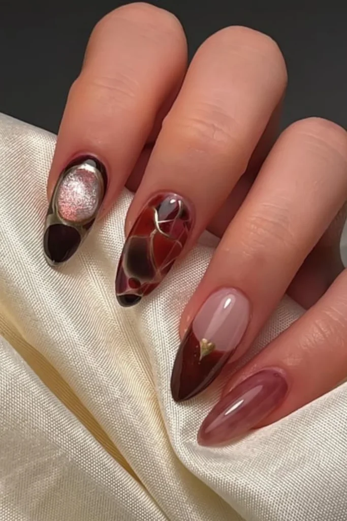 Moody burgundy and metallic cat-eye gel nail art design for fall transition nails ideas