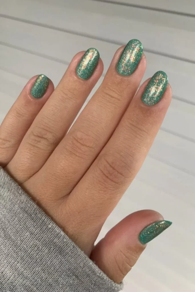 Sage green sparkling glitter oval nails for cozy fall transition nails ideas